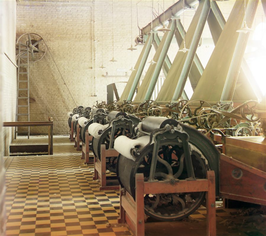 Textile mill interior with production machinery